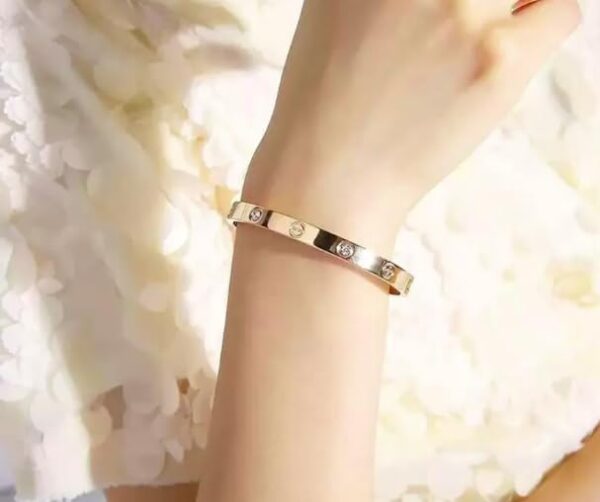 Aeoss Stainless Steel Gold Love Band Bracelet with Cubic Zirconia Studded Bangle Kada | Gift on any Occassion for Women and Girls | Anti Tarnish Waterproof Sweatproof - Image 4